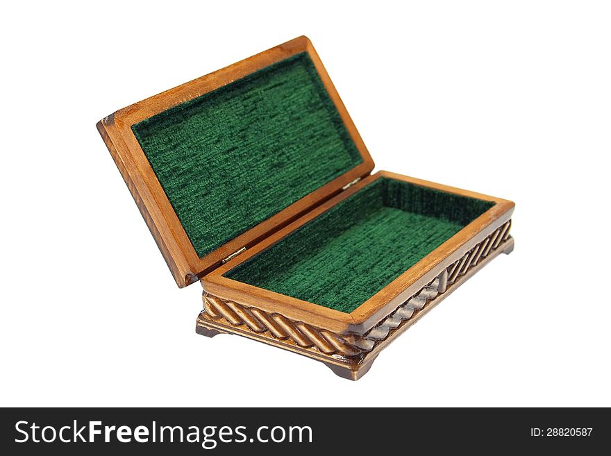 Wooden casket decorated with carvings, standing on a white background. Wooden casket decorated with carvings, standing on a white background
