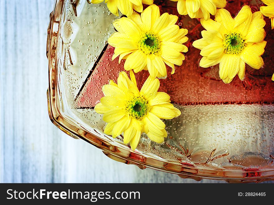 Yellow flower background with water