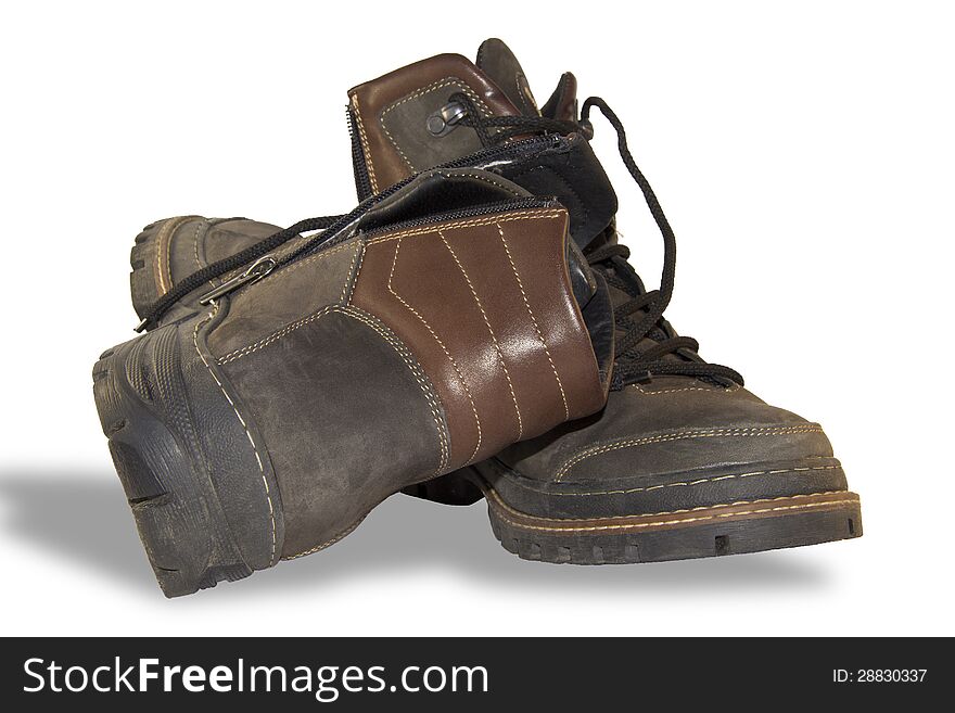 Pair of winter boots on a white background