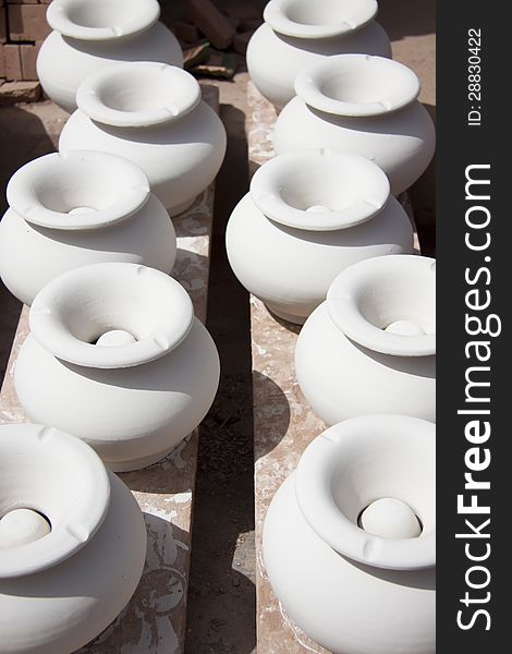 White clay ashtray stand in a row. White clay ashtray stand in a row