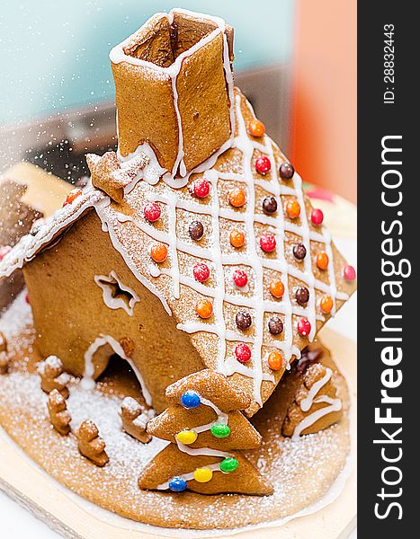 Top view of a gingerbread house with trees. Top view of a gingerbread house with trees