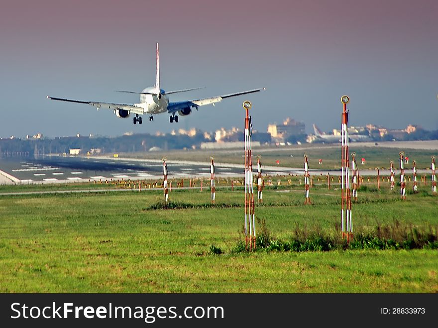 Passenger plane landing in the airport. Passenger plane landing in the airport