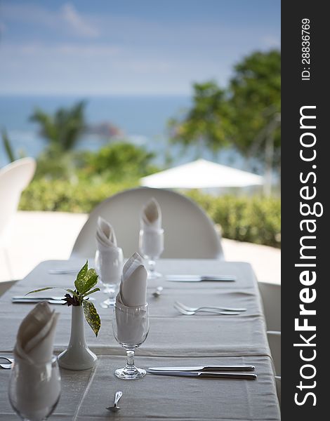 Chairs and table set up for dinner on luxury resort in Costa Rica. Chairs and table set up for dinner on luxury resort in Costa Rica