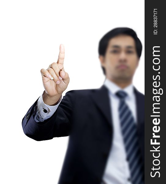 Businessman pushing on a touch screen an imaginary