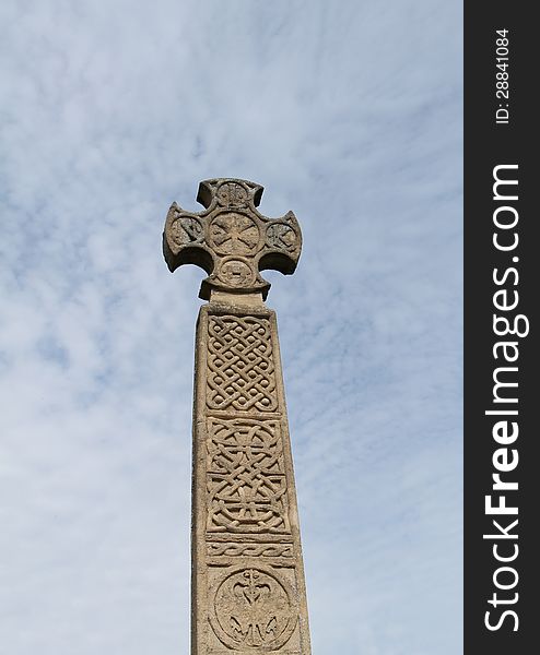 A Tall Stone Made Historical Cross Memorial.