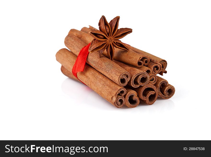 Cinnamon and anise  on white background