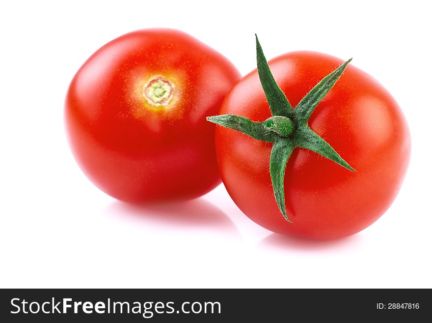 Two tomato  on white, close up