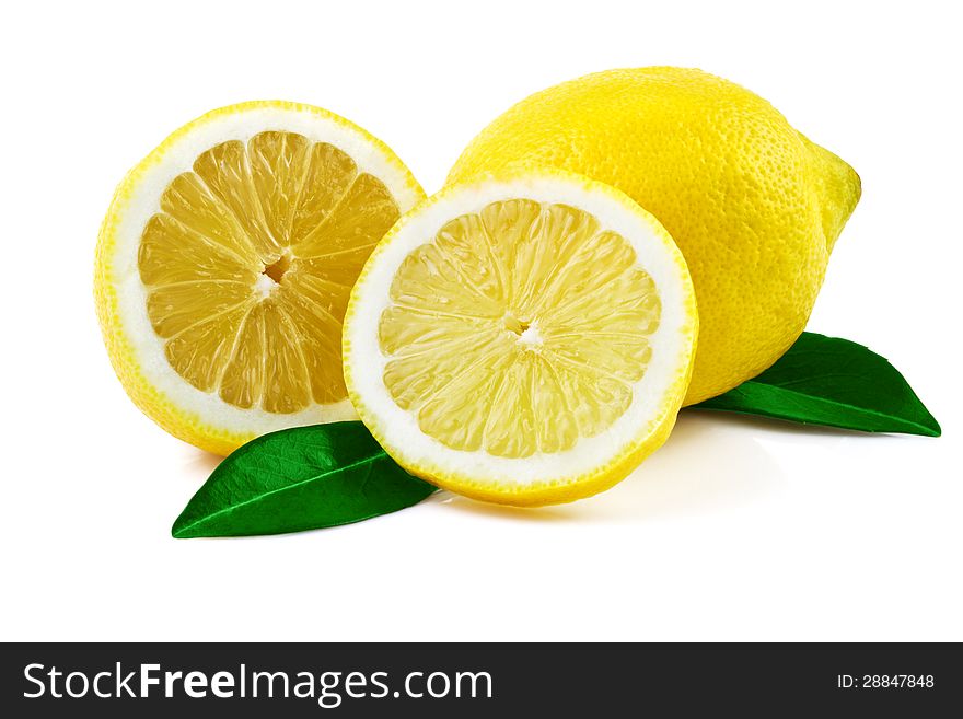 Fresh Lemon With Leaves On White
