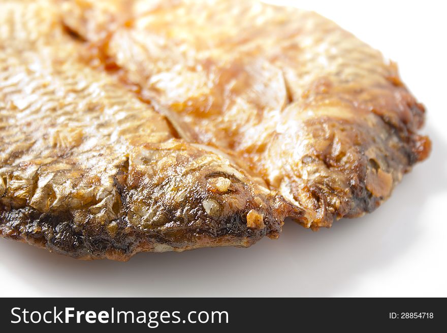 Closeup Dried fish fried with Flour on white. Closeup Dried fish fried with Flour on white.