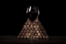 Glass With Red Wine Against Wine Jams Stock Photography Glass With Red Wine Against Wine Jams Stock Photography