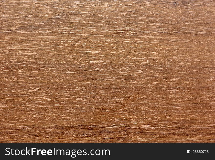 Light brown wooden texture walnut wood background. Light brown wooden texture walnut wood background