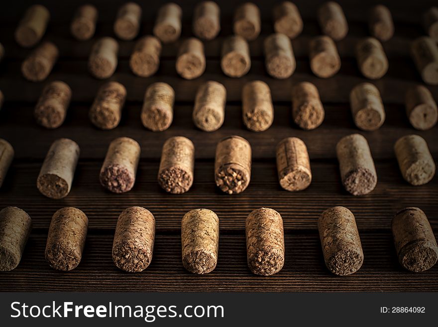 Set of wine plugs correctly lying on black background