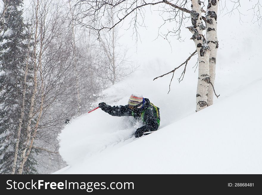 Freerider in the mountains of Siberia in december. Freerider in the mountains of Siberia in december