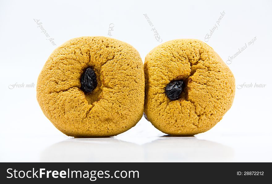 Raisin cupcakes on a white background
