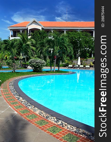 Beautiful tropical swimming pool at luxury resort. Beautiful tropical swimming pool at luxury resort