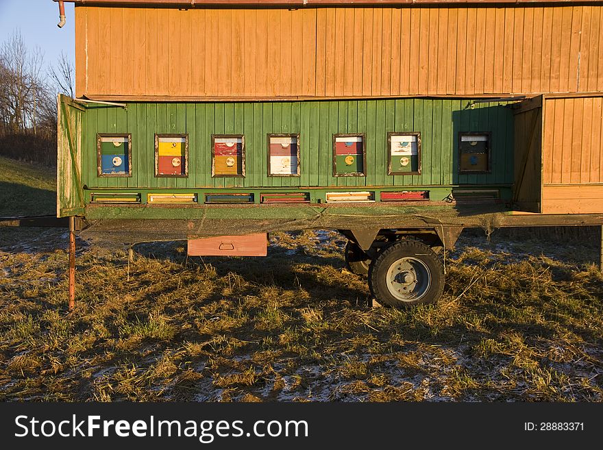 Colorful entrances to dwelling bee, mobile bee hive in the meadow. Colorful entrances to dwelling bee, mobile bee hive in the meadow