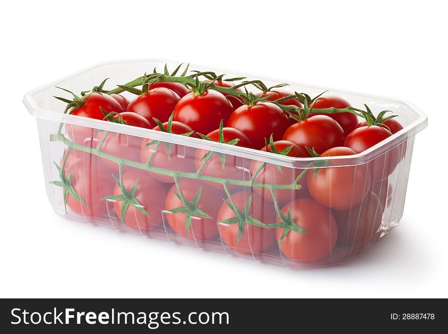 Cherry tomatoes on a branch in retail packaging