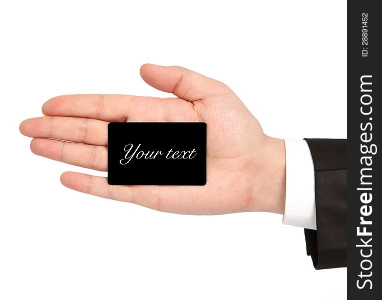 Isolated hand of a businessman in a suit holding a black business card. Isolated hand of a businessman in a suit holding a black business card