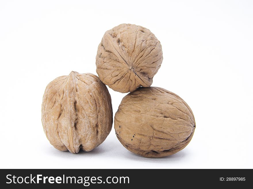 Walnut with soft shadow over white background