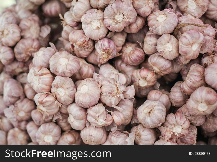 Close Up Of Garlic Background.