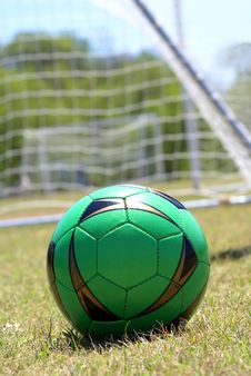 Soccer Ball In Green Royalty Free Stock Photos