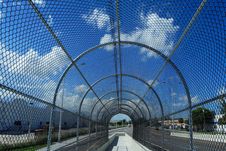 Fenced Walkway On Blue Sky Stock Image