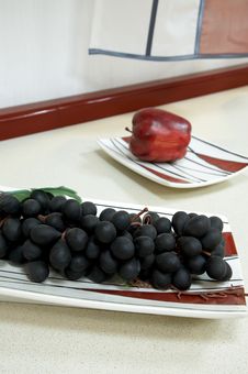 Grapes And Apple Stock Photography
