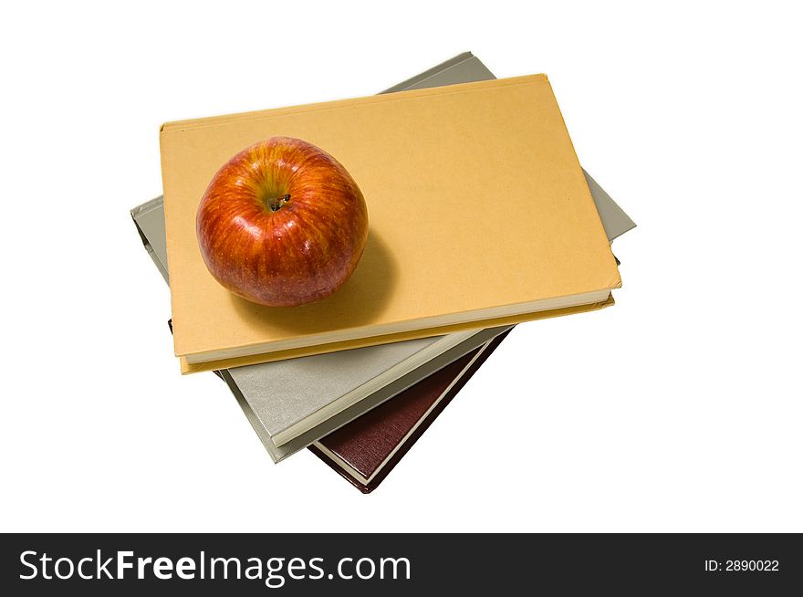 School books and apple