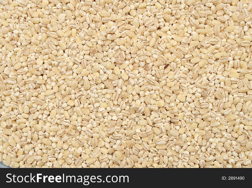 Grains of raw barley in a sack. Grains of raw barley in a sack.