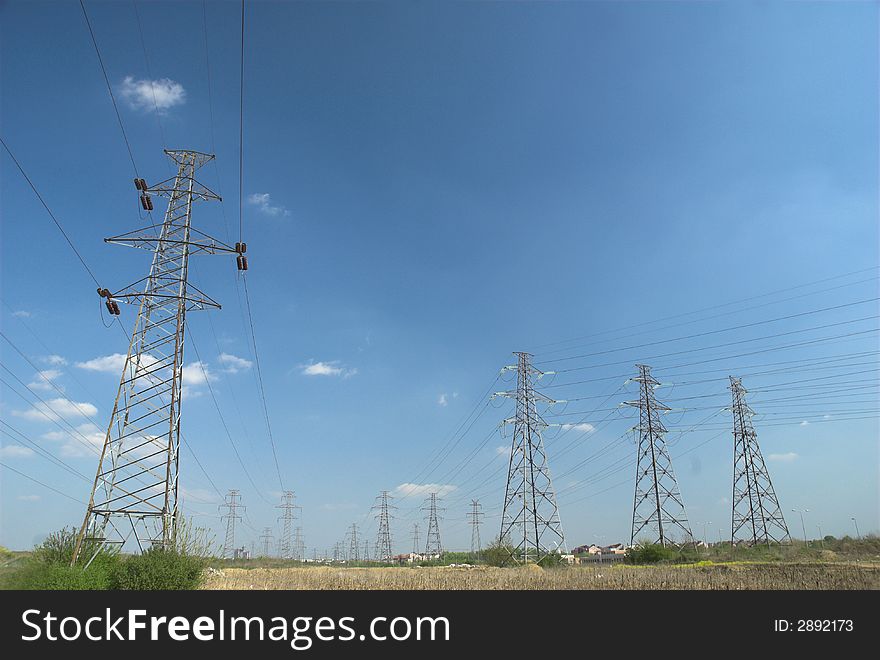 Electricity pylons and power line in suburbean landscape. Electricity pylons and power line in suburbean landscape