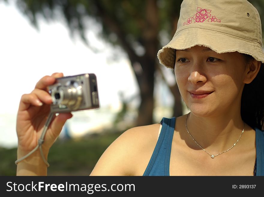 Asian Lady With Camera