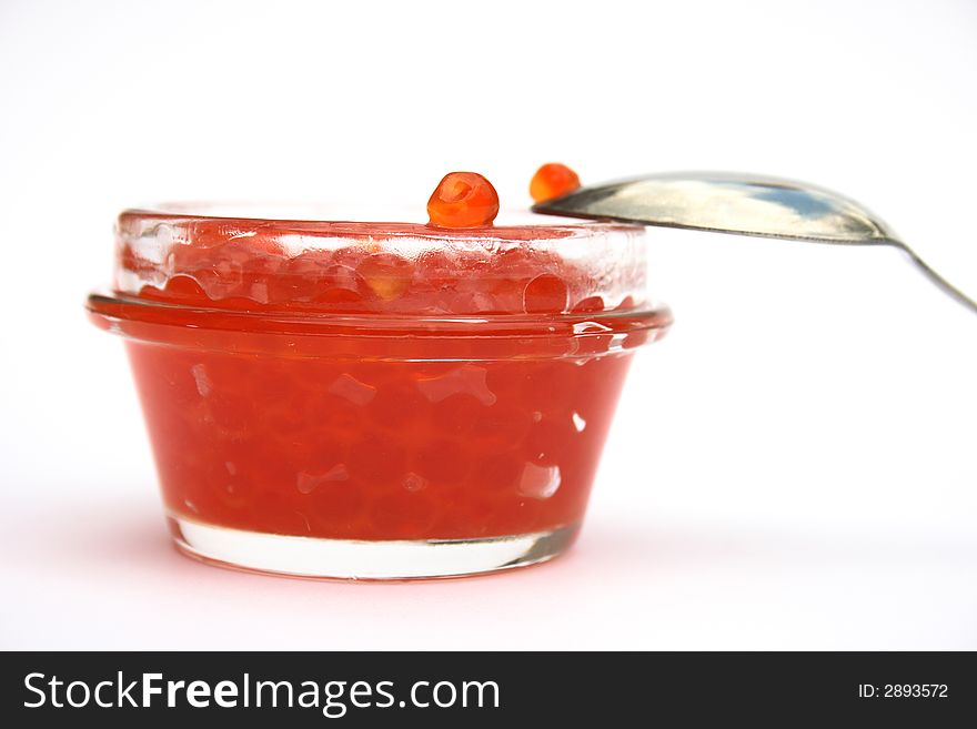 Red caviar in bank. It is isolated