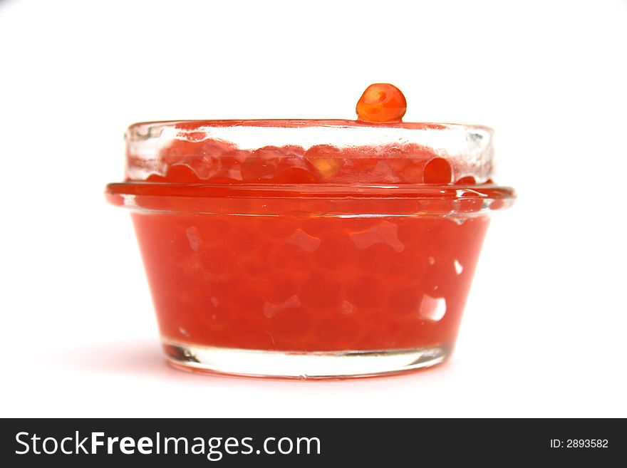 Red caviar in bank. It is isolated