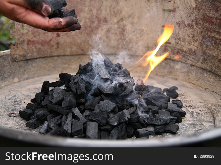 Barbecue started, coal, flame and smoke,. Barbecue started, coal, flame and smoke,