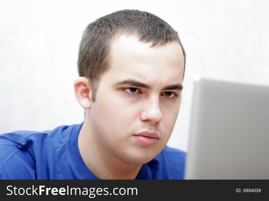 Student Working On His Laptop