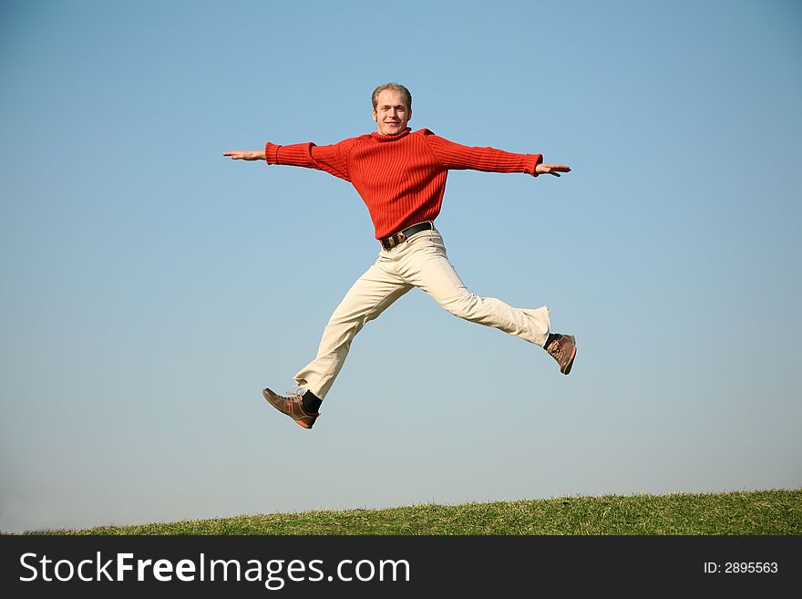 Man jumps against the sky