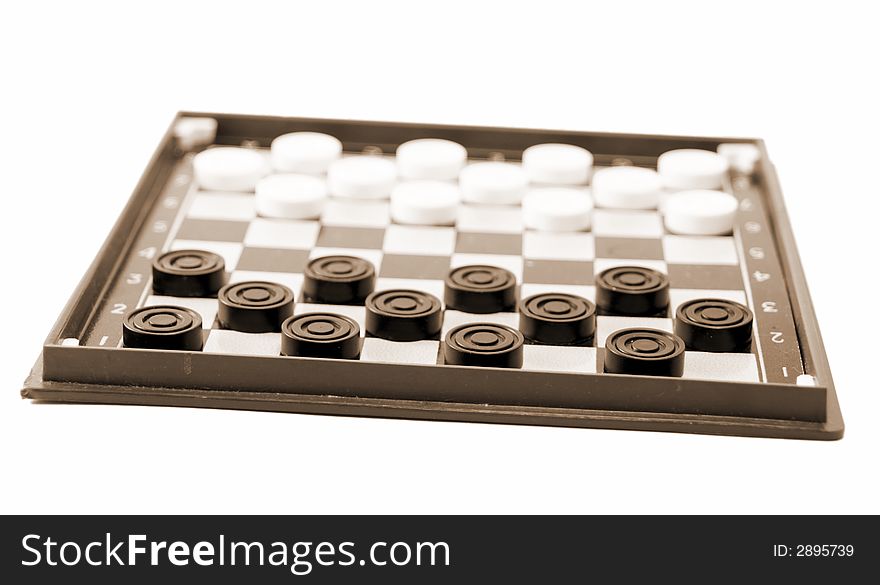It is black white checkers on a game floor.
