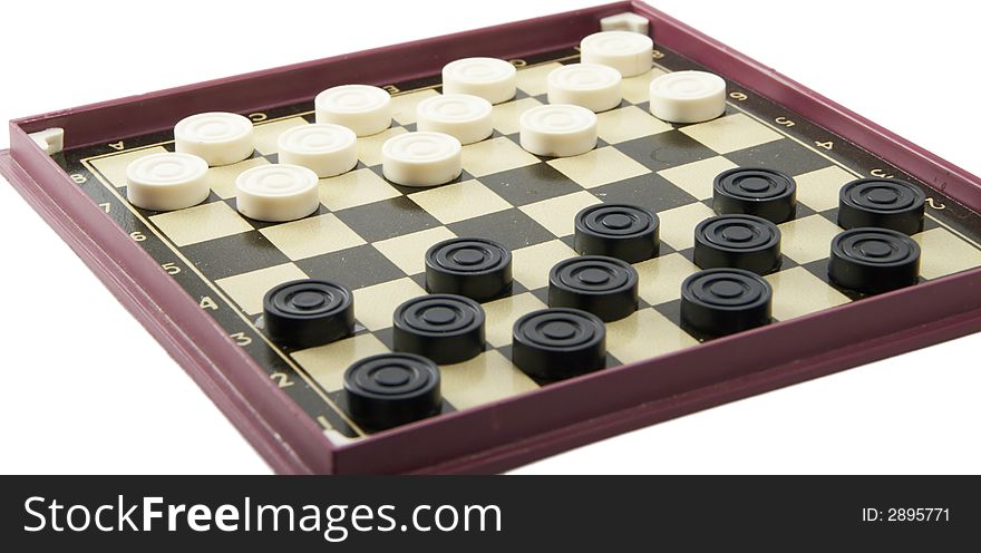 It is black white checkers on a game floor.
