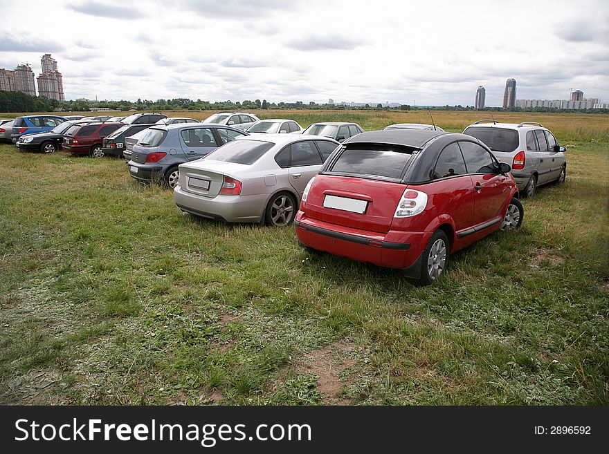 Varios cars on the meadow