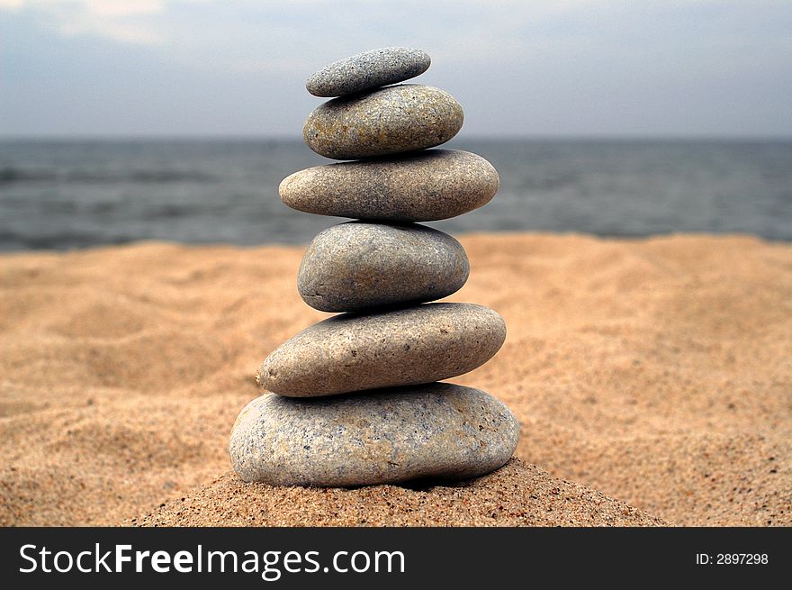 Pebble Stack On The Seashore