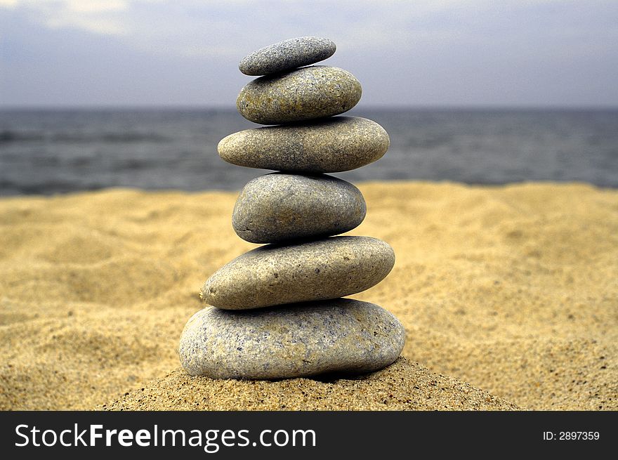 Pebble Stack On The Seashore