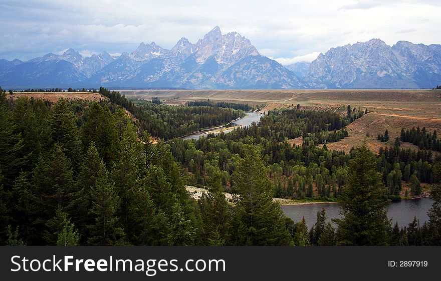 The Grand Teton and Snake River, Wyoming, on a rainy summer evening.