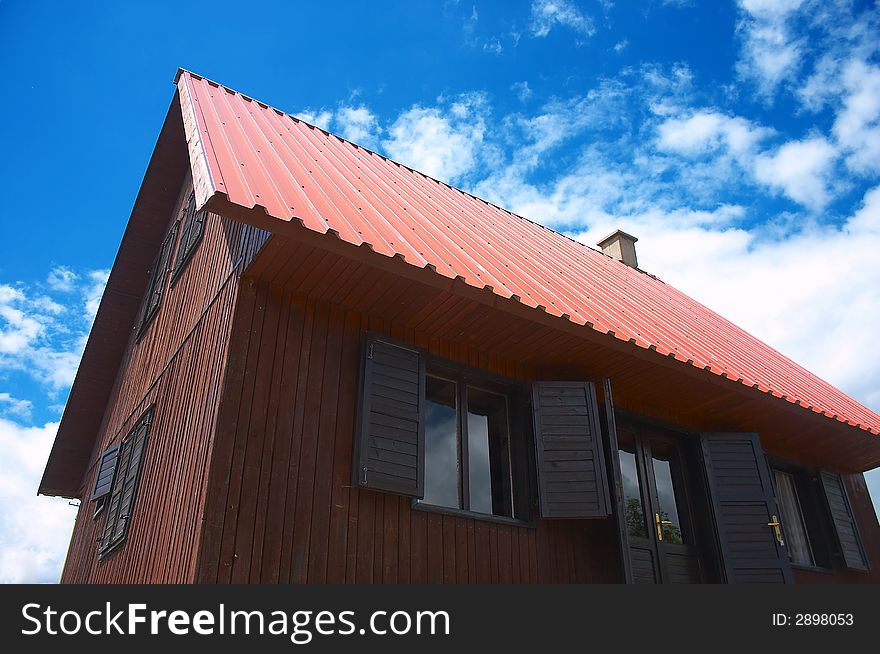 Wooden mountain house on a clear day