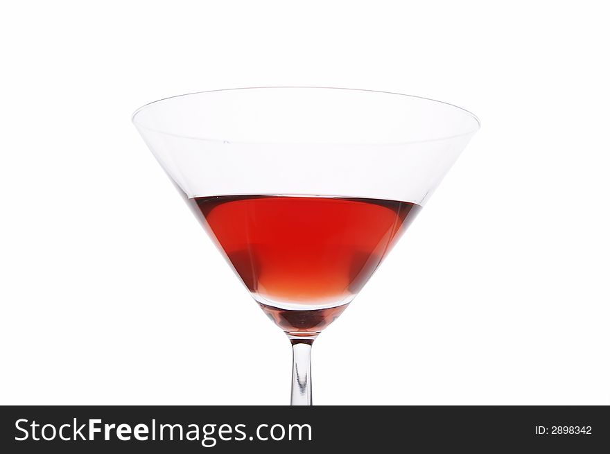 Red cocktail glass close up on white background
