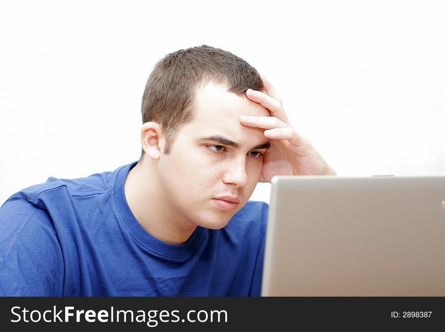 Student working on his laptop