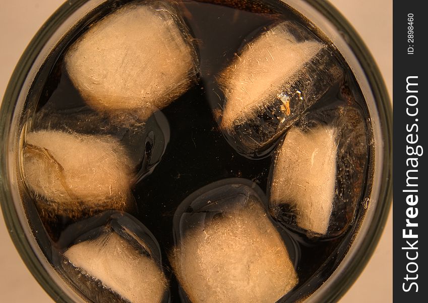 Cola drink with ice cubes