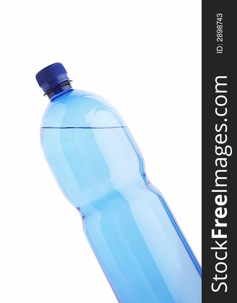 Isolated water bottle on white reflective background
