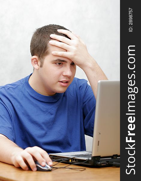 Student Working On His Laptop