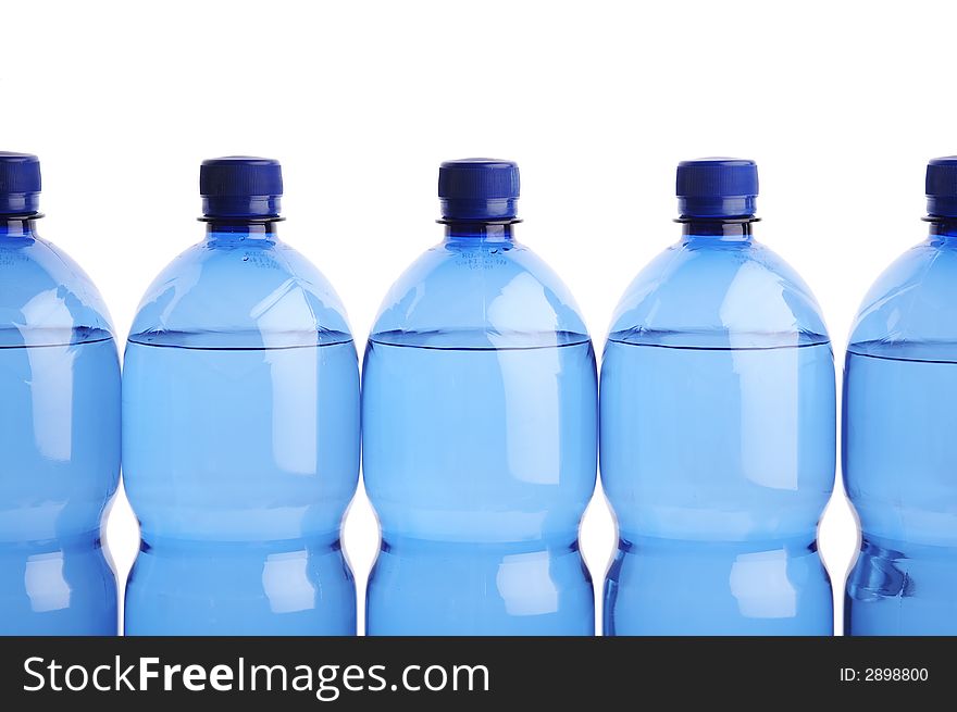 Plastic water bottles on the white background. Plastic water bottles on the white background