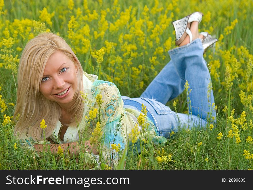 Pretty caucasian girl on the meadow